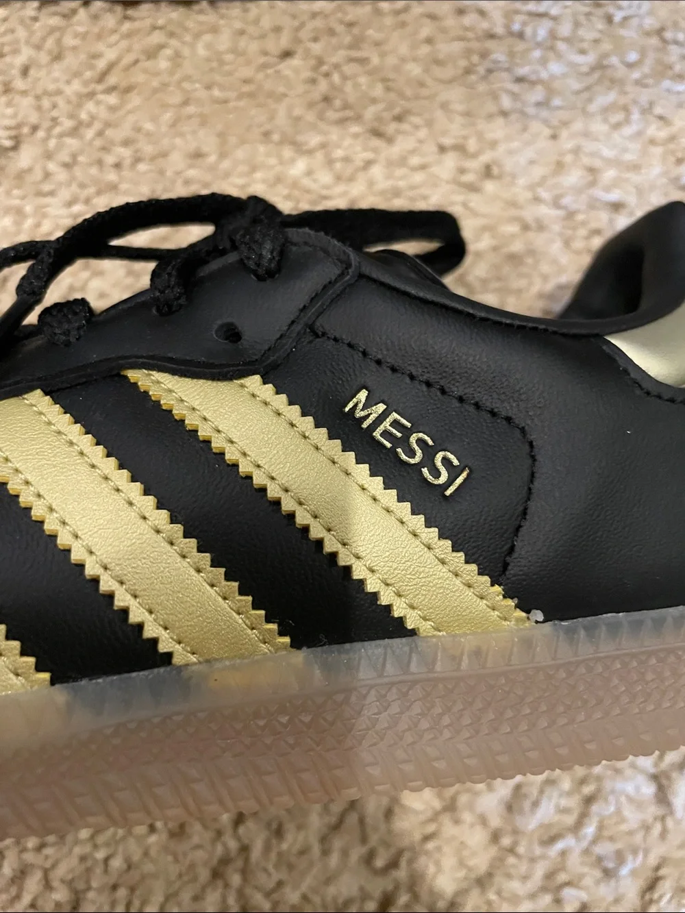 adidas boys Black and Gold Messi sneakers size 4 1/2.